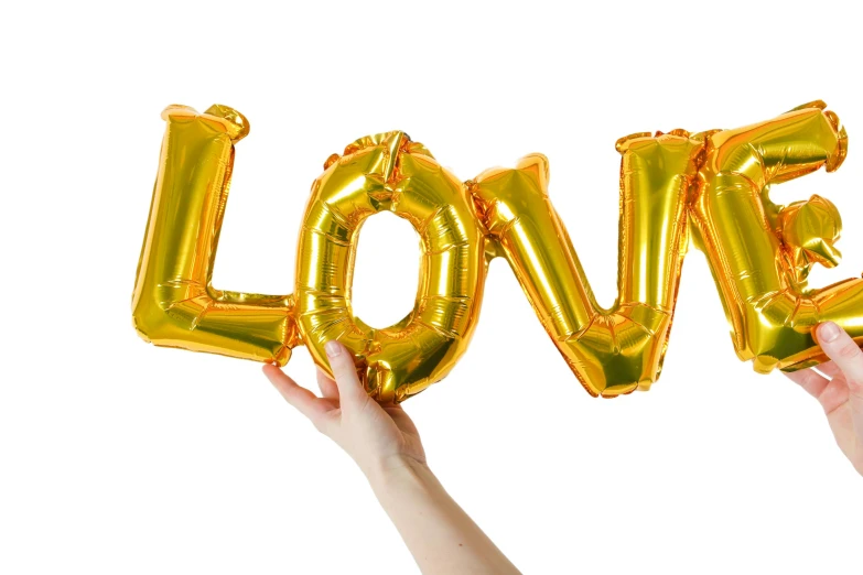 a person holding up a gold love balloon, full product shot, low details, yellow-orange, party balloons