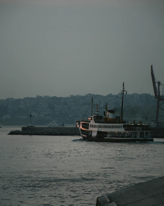 a boat that is sitting in the water, a statue, pexels contest winner, hurufiyya, istanbul, non-binary, very hazy, gif