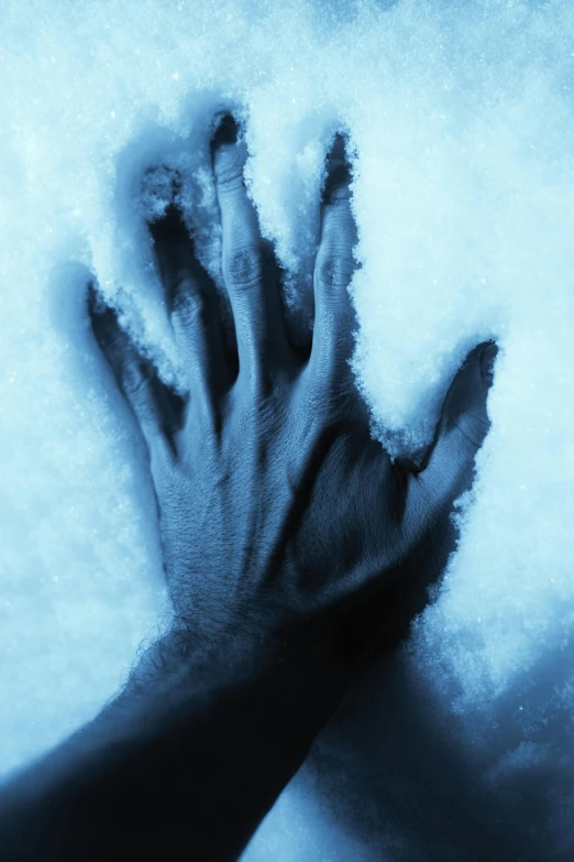 a close up of a person's hands in the snow, an album cover, inspired by Gottfried Helnwein, pexels contest winner, blue ice, cryptids, terrified, ice age