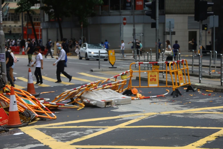 a group of people standing on the side of a road, scaffolding collapsing, stanley lau, road street signs, avatar image