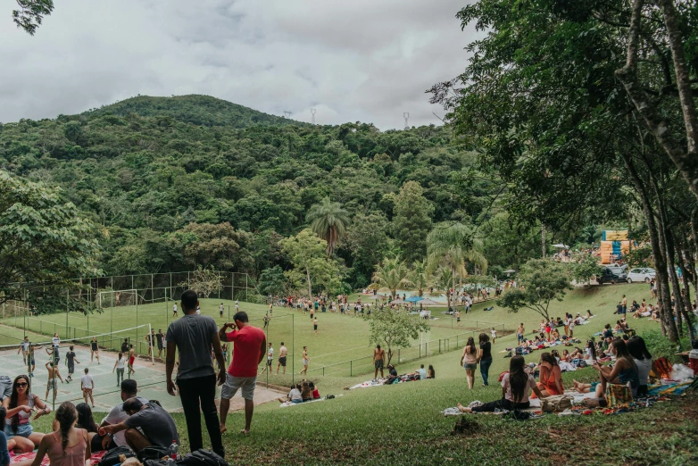 a group of people sitting on top of a lush green field, são paulo, tournament, las pozas, instagram picture