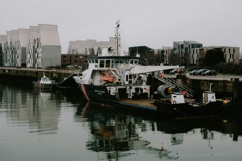 a boat that is sitting in the water, harbour, engineering bay, instagram picture, slight overcast lighting