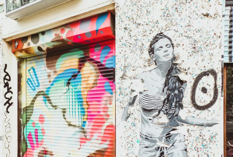 a mural of a woman on the side of a building, graffiti art, trending on pexels, street art, covered in sprinkles and crumbs, diptych, street of paris photography, south beach colors
