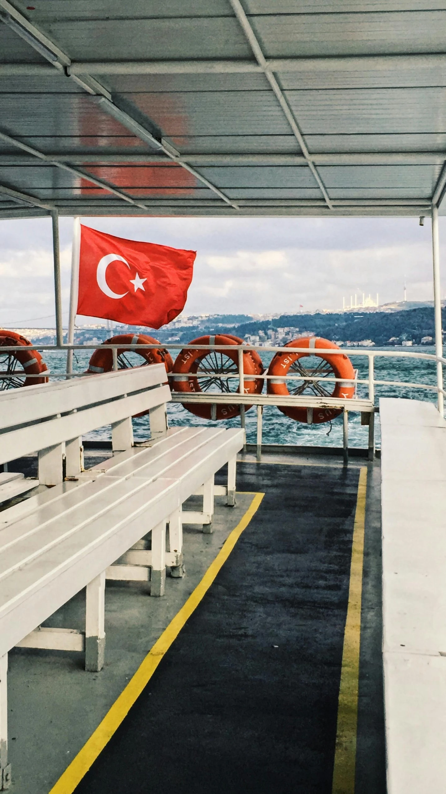 a boat with a turkish flag on the deck, a colorized photo, by irakli nadar, pexels, hurufiyya, thumbnail, multiple stories, snapchat photo, white