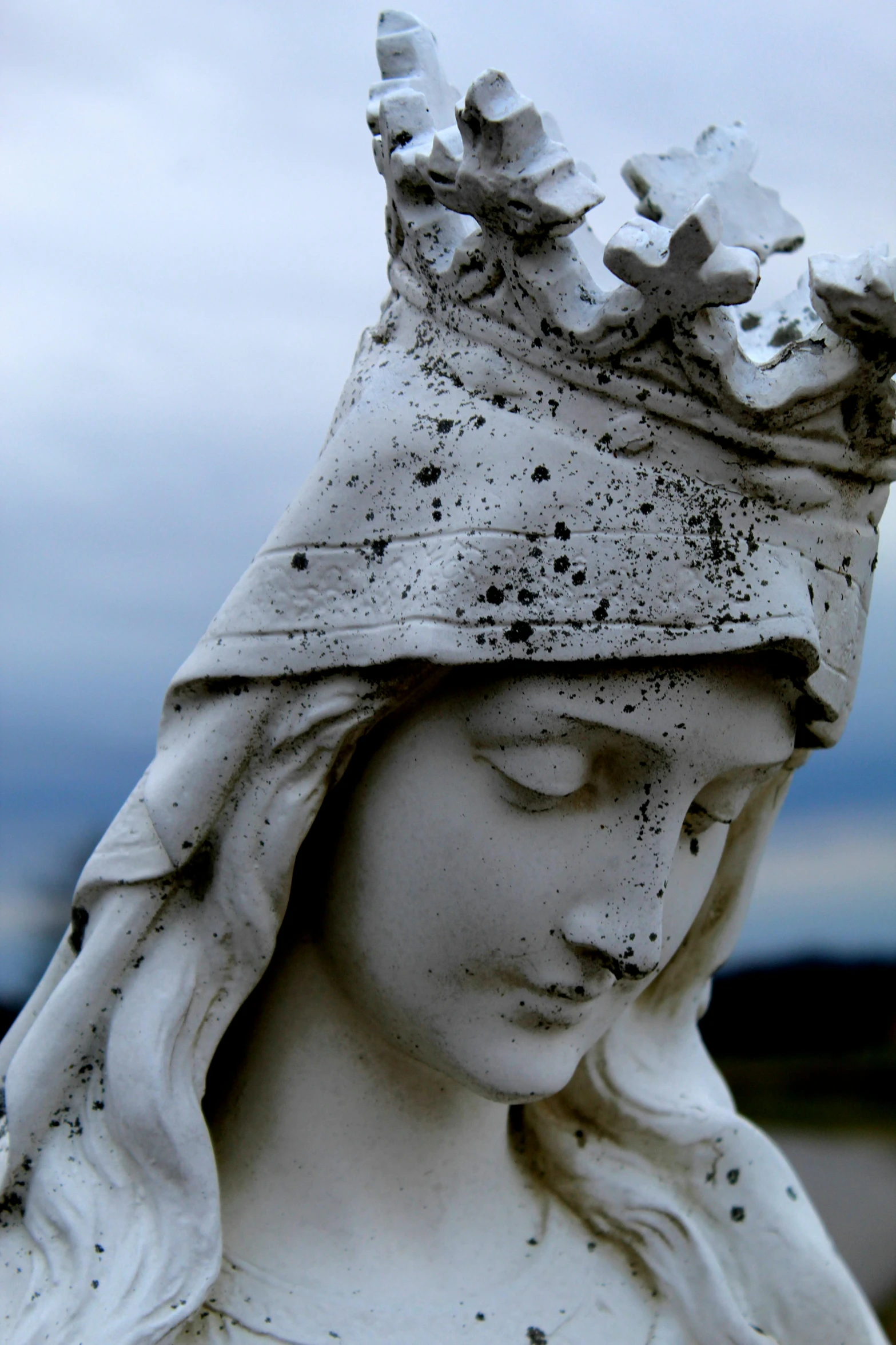 a statue of a woman with a crown on her head, by Matt Cavotta, slide show, virgin mary, battered, slight overcast weather