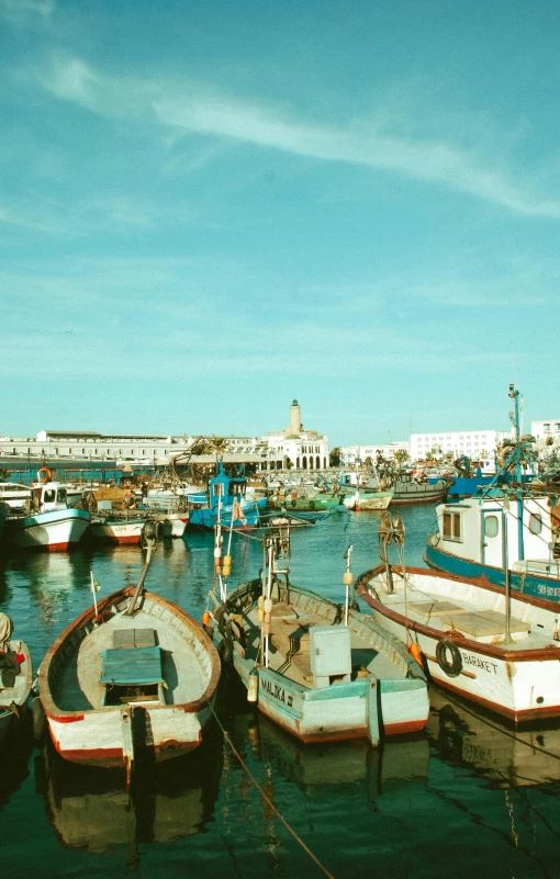 a number of boats in a body of water, by Altichiero, happening, moroccan city, photo taken on fujifilm superia, square, apulia