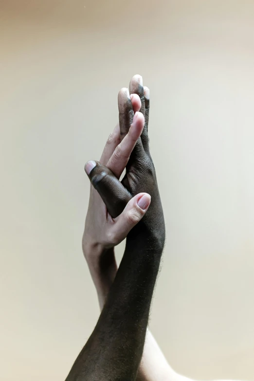 a close up of two hands holding each other, by Alison Geissler, black main color, balance, thomas kinade, two - tone