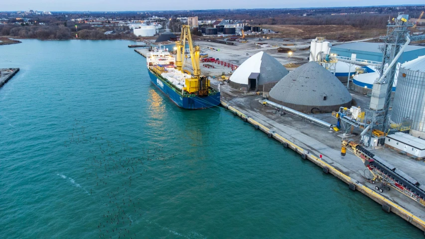 a large ship in the middle of a body of water, biroremediation plant, david a trampier, thumbnail, hull