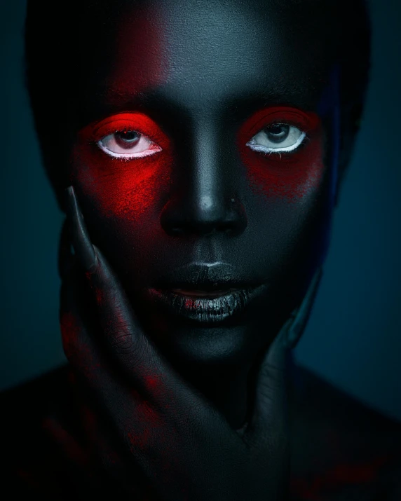 a woman with red light on her face, inspired by Hedi Xandt, pexels contest winner, afrofuturism, panel of black, black+velvet+red+turquoise, non binary model, girl with white eyes