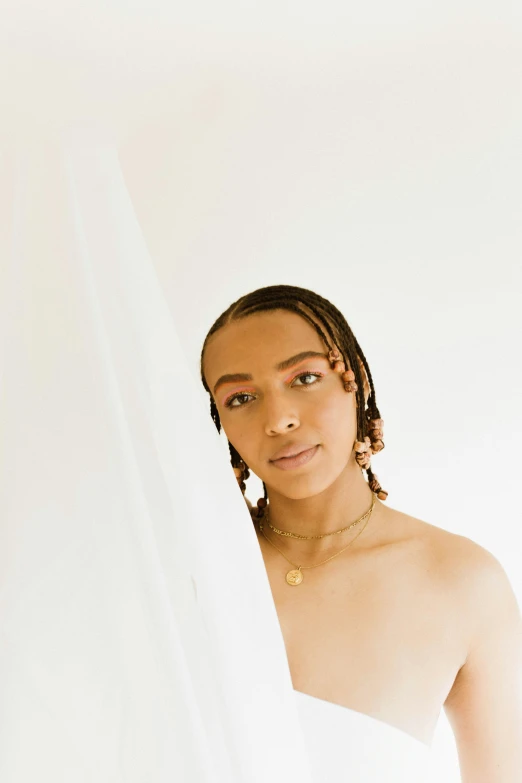 a woman in a white dress holding a surfboard, an album cover, inspired by Theo Constanté, trending on pexels, cornrows braids, in bathroom, nonbinary model, headshot portrait