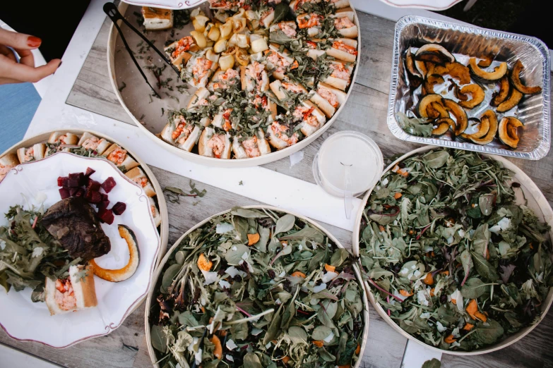 a table topped with lots of different types of food, unsplash, renaissance, background image, midsommar - t, white, oceanside