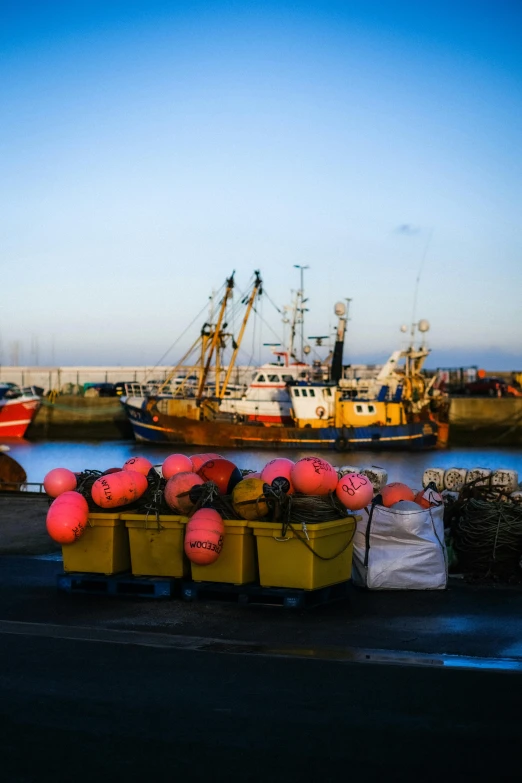 a group of boats that are sitting in the water, by Jacob Toorenvliet, pexels contest winner, process art, maryport, square, fish seafood markets, late afternoon