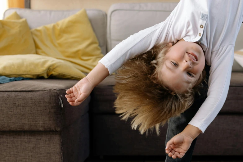 a little girl doing a handstand on a skateboard, pexels contest winner, visual art, relaxing on the couch, flipped out hair, a blond, silly playful fun face