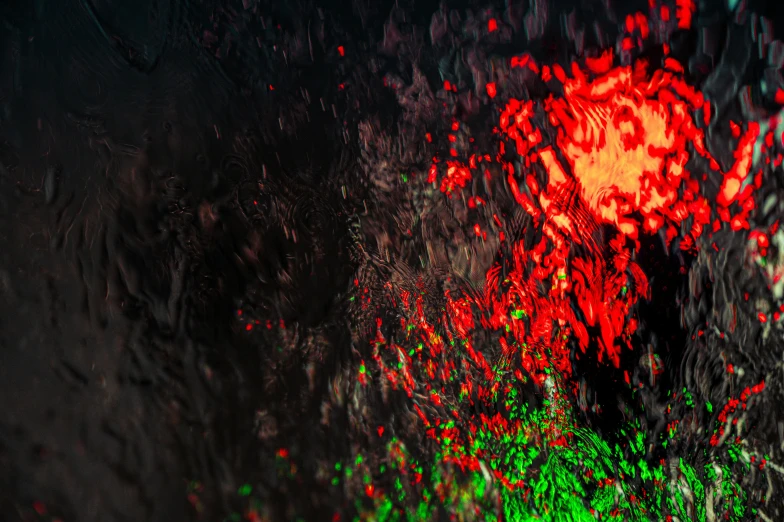 a red traffic light sitting on the side of a road, an album cover, inspired by Elsa Bleda, pexels contest winner, generative art, street lights water refraction, apophysis av 8 k uhd, green and red radioactive swamp, organic liquid textures