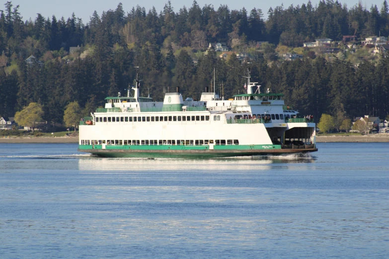 a large ferry traveling across a large body of water, green lines, puyallup berteronian, beautiful views, multiple stories