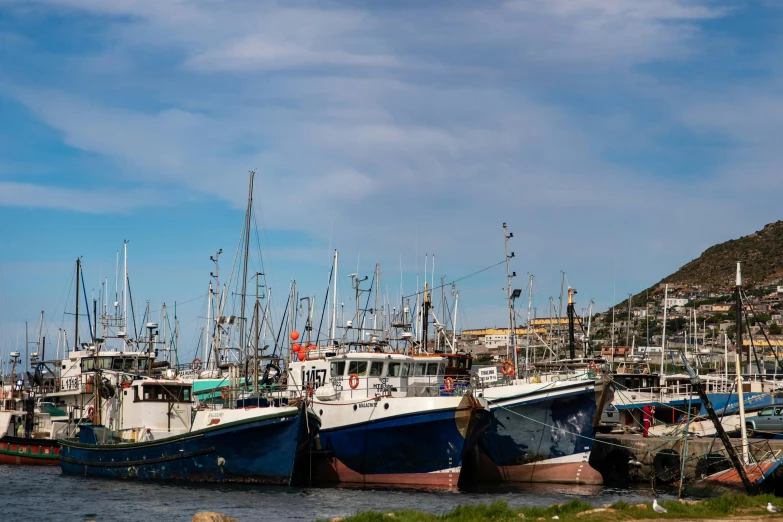 a bunch of boats that are sitting in the water, pexels contest winner, fish seafood markets, south african coast, thumbnail, great quality