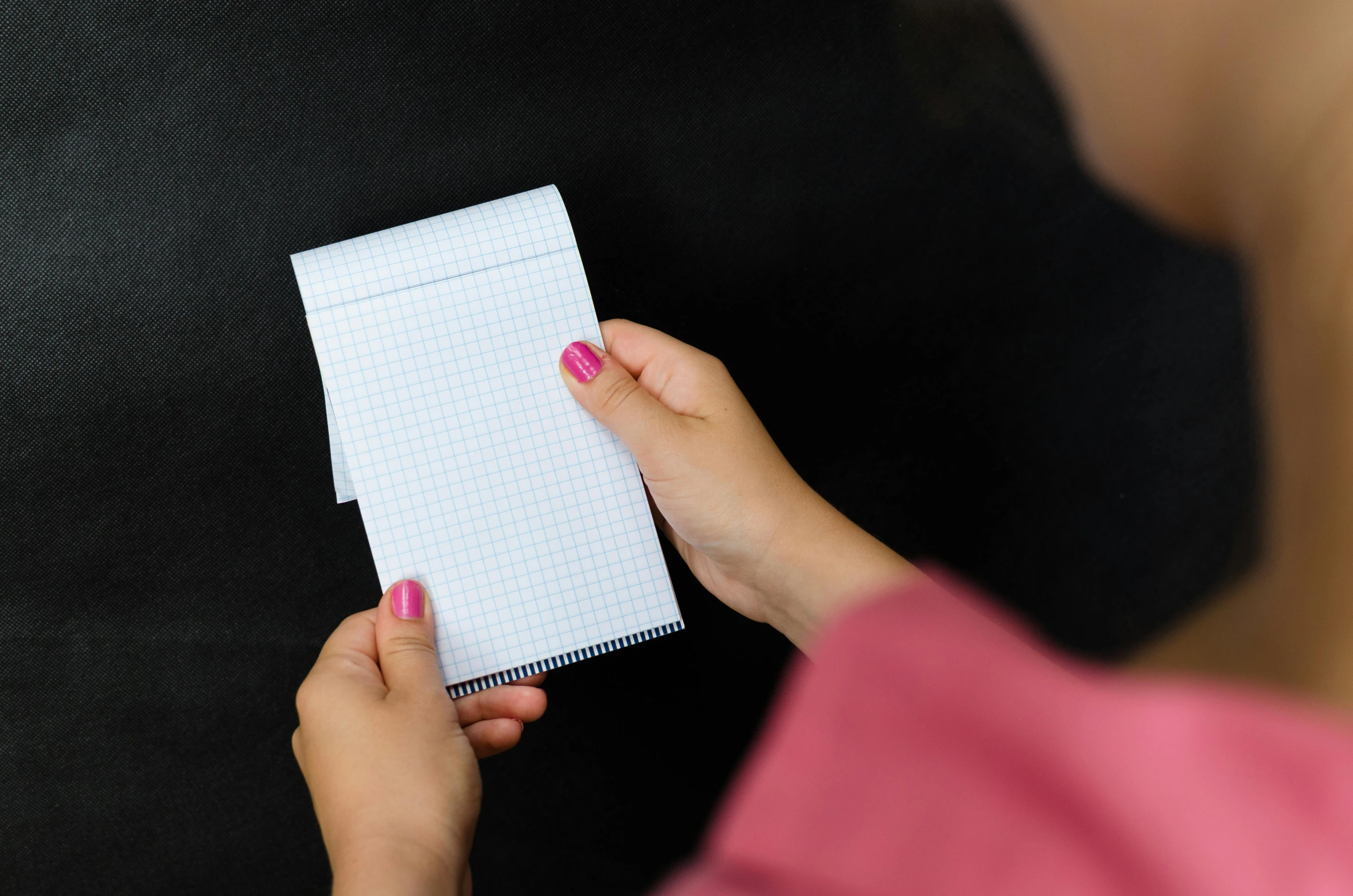 a close up of a person holding a piece of paper, notebook, square, thumbnail, malika favre