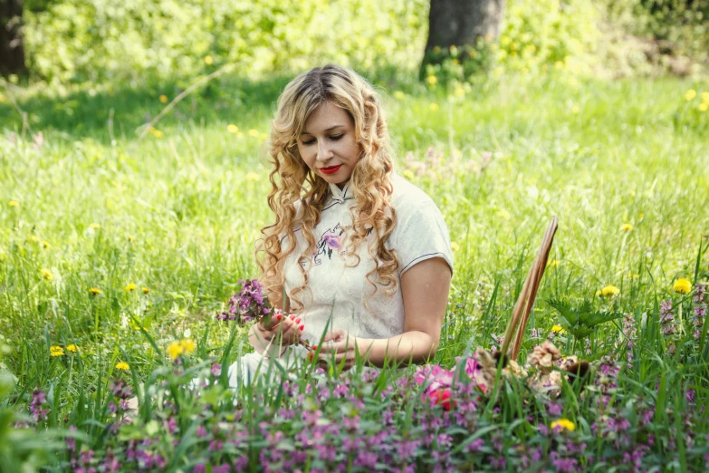 a woman sitting in a field of flowers, a portrait, by Maksimilijan Vanka, pixabay contest winner, curly blonde hair | d & d, garden with flowers, picking flowers, avatar image