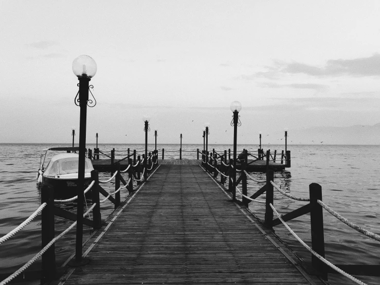 a black and white photo of a pier, unsplash, romanticism, photographic print, artwork empty daylight, instagram picture, vintage photo