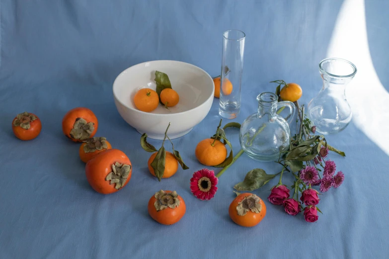 a close up of a bowl of fruit on a table, a still life, inspired by Cornelis de Heem, pexels contest winner, hyperrealism, cyan and orange, dried flowers, scientific glassware, various posed