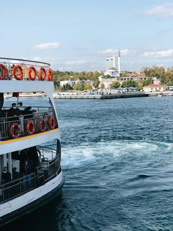 a large boat on a body of water, a picture, pexels contest winner, hurufiyya, mixture turkish and russian, 🚿🗝📝, view from side, 2 5 6 x 2 5 6 pixels