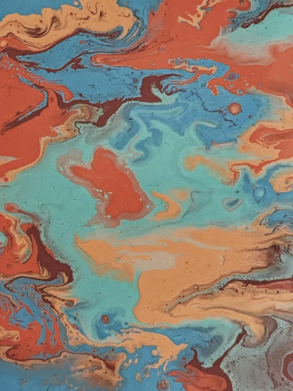 a close up of a colorful marbled surface, by Mandy Jurgens, burnt sienna and cerulean blue, wet clay, earthwave, tropical reef