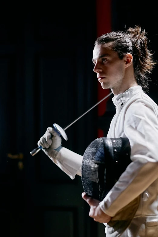 a woman in a fencing stance holding a sword, a portrait, inspired by Horace Vernet, trending on unsplash, handsome man, slide show, production photo, julian ope