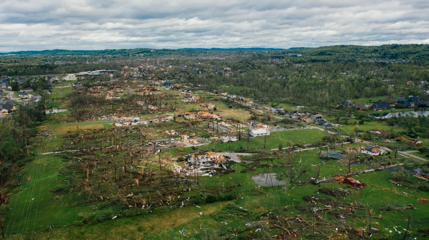 a small town surrounded by trees and debris, beautiful tornado, tn, fan favorite, 2024