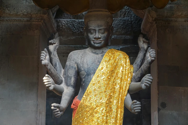 a close up of a statue of a person, inspired by Tang Di, pexels contest winner, fully covered in drapes, angkor wat, sequins, full body image