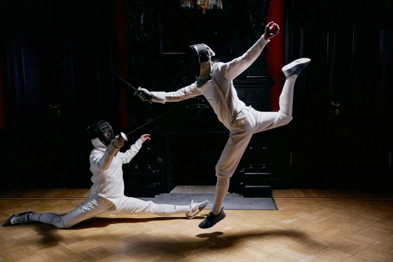 a couple of men standing on top of a wooden floor, pexels contest winner, arabesque, fencing, [ theatrical ], silver，ivory, annie leibowitz