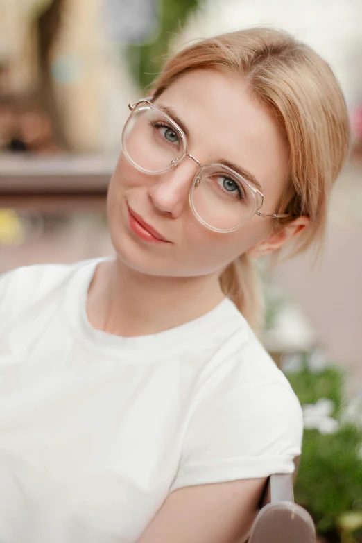 a woman wearing glasses sitting on a bench, delicate eyebrows, ekaterina, wearing a light shirt, zoomed in