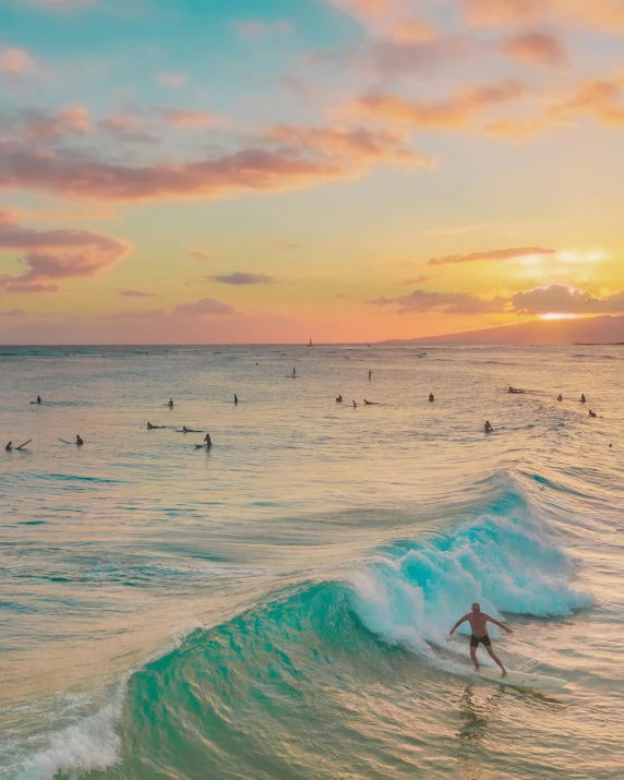 a man riding a wave on top of a surfboard, by Robbie Trevino, pexels contest winner, pastel sunset, posing in waikiki, people swimming, multiple stories