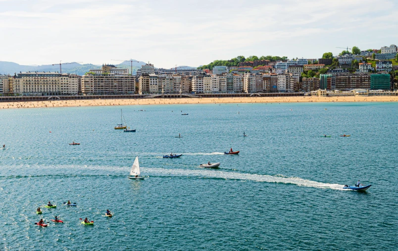 a large body of water filled with lots of boats, inspired by Eva Gonzalès, pexels contest winner, oscar niemeyer, at the seaside, spain, wales