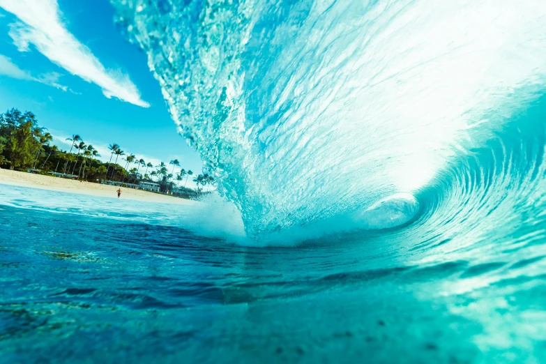 a man riding a wave on top of a surfboard, pexels contest winner, tones of blue and green, hawaii beach, inside the curl of a wave, instagram post