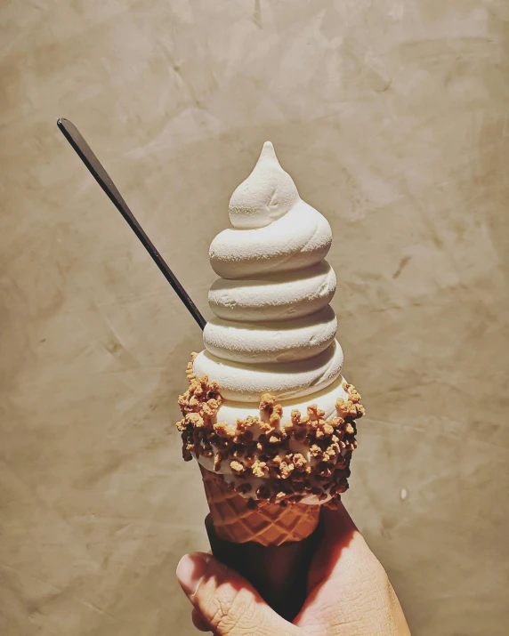 a close up of a person holding an ice cream cone, bangkuart, instagram post, spiral, creamy skin