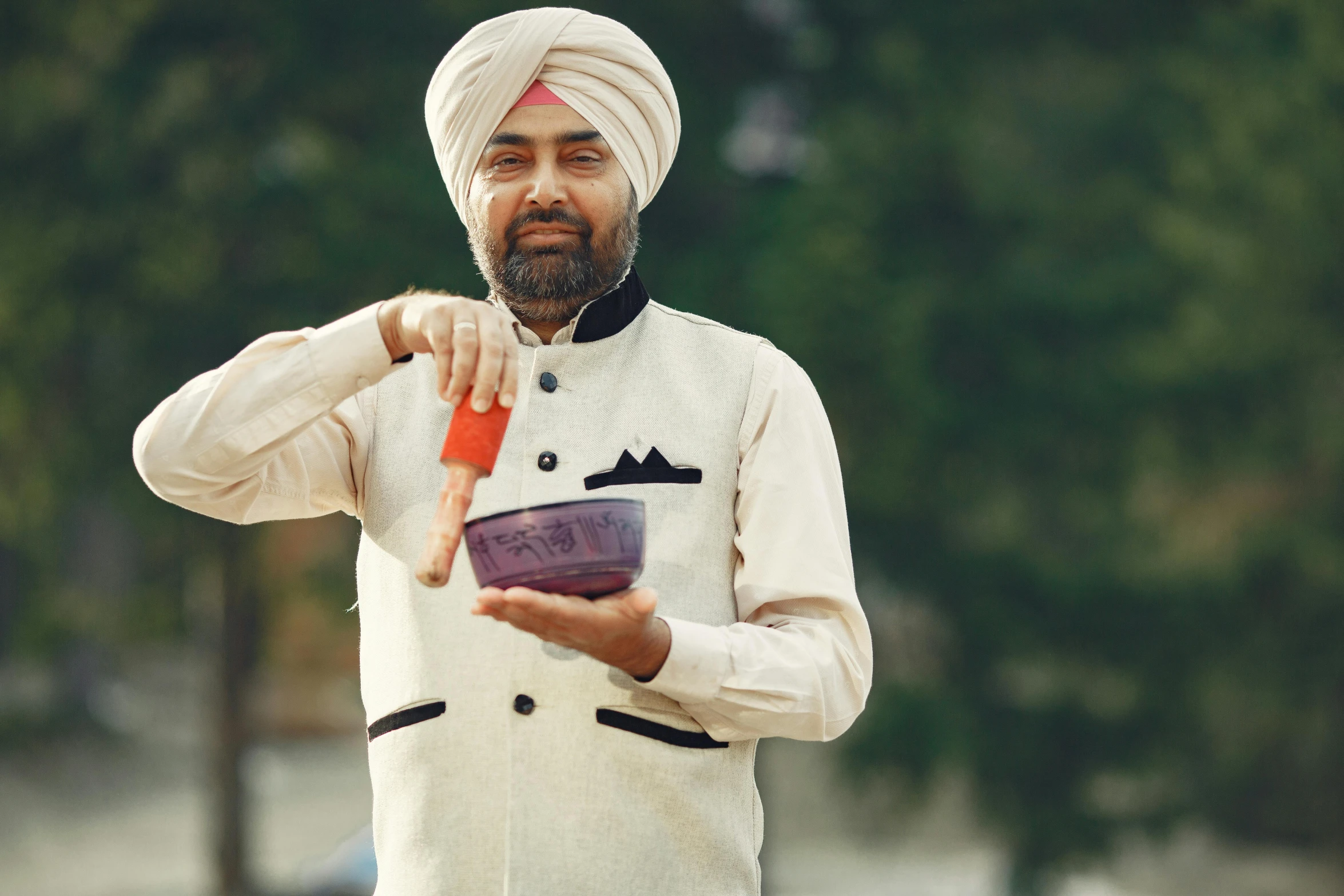 a man in a turban holding a carrot, an album cover, by Manjit Bawa, pexels contest winner, holding a bell, chemistry, 15081959 21121991 01012000 4k, caring fatherly wide forehead
