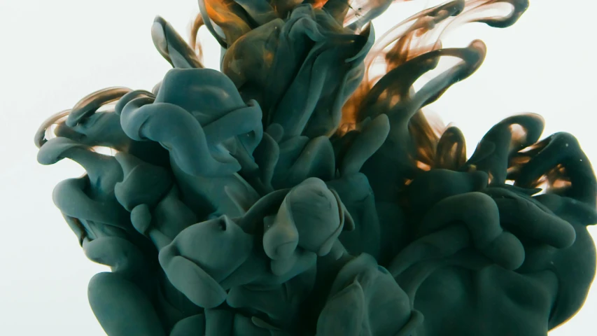 a close up of a liquid substance in water, inspired by Alberto Seveso, unsplash contest winner, black gold smoke ink, dark teal, dark grey and orange colours, video still