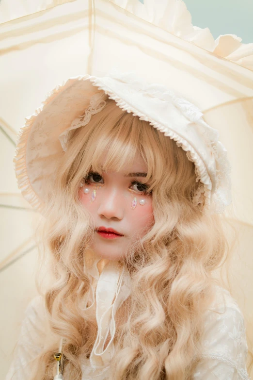 a little girl that is holding an umbrella, by Ayami Kojima, reddit, rococo, wearing a white bathing cap, long fluffy curly blond hair, close - up studio photo, fairycore