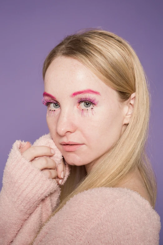 a woman with pink makeup posing for a picture, an album cover, inspired by Louisa Matthíasdóttir, trending on pexels, plain background, tired eyes, lily frank, with a white complexion