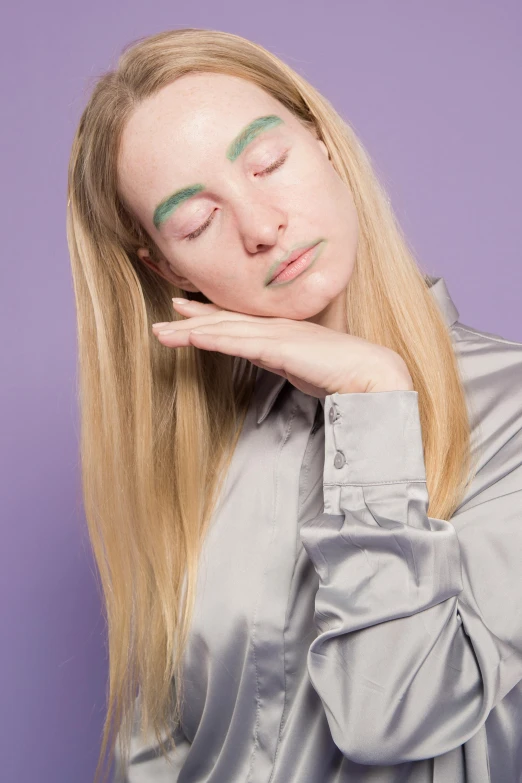 a woman is posing with her eyes closed, inspired by Louisa Matthíasdóttir, synchromism, pastel makeup, press shot, raised eyebrows, purple and green