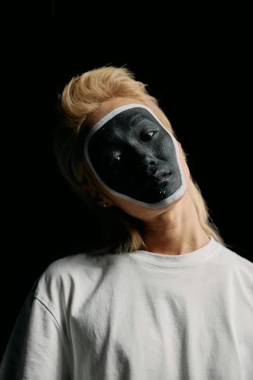 a woman with black paint on her face, an album cover, inspired by jeonseok lee, trending on pexels, gray alien, androgyny, xqc, fujifilm”