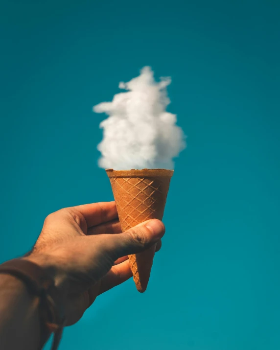 a person holding an ice cream cone with steam coming out of it, pexels contest winner, white fluffy cloud, thumbnail, 10, resin