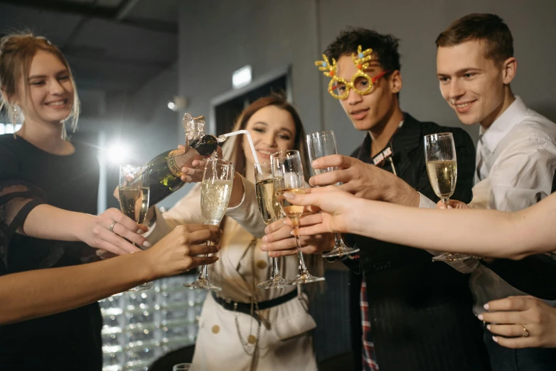 a group of people holding glasses of champagne, pexels contest winner, renaissance, underground party, thumbnail, wearing festive clothing, promotional image