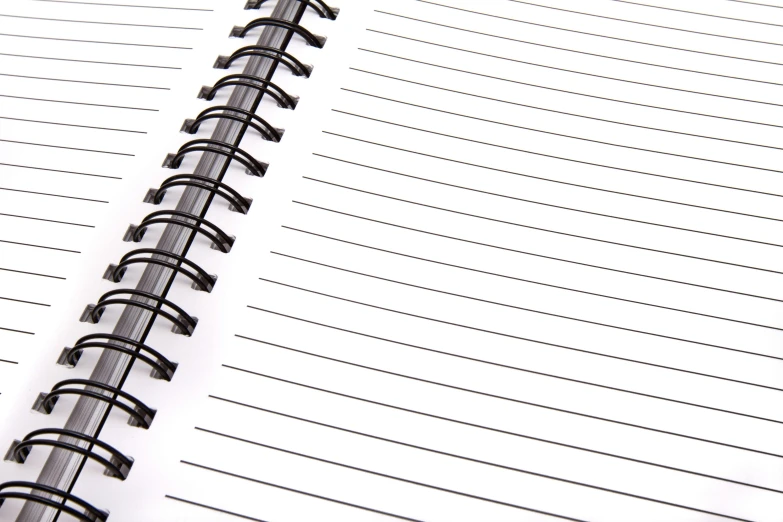 a black and white photo of a spiral notebook, minimalism, high key detailed, vivid lines, mid shot photo