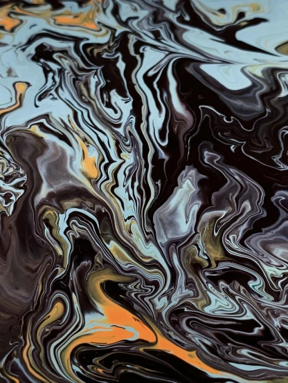 a close up of a liquid substance on a surface, inspired by Umberto Boccioni, trending on pexels, mocha swirl color scheme, painted black, made of liquid, oil-on-canvas