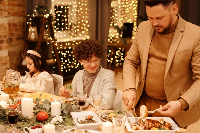 a man serving food to a group of people at a dinner table, holiday season, 1 petapixel image, brown, 3 - piece