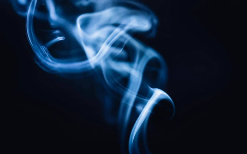 a close up of smoke on a black background, by Daniel Lieske, unsplash, blue blurred, instagram post, joints, thin blue arteries