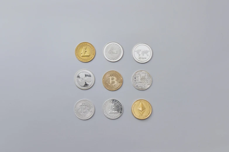 a bunch of coins sitting on top of a table, product image, on a gray background, edible crypto, geometrically realistic