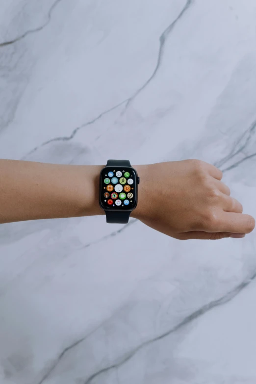 a person holding an apple watch on their wrist, trending on pexels, hypermodernism, square, on a gray background, talking, 8 k resolution : 0. 8