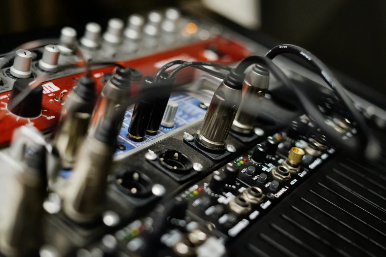 a bunch of electronic equipment sitting on top of a table, an album cover, by Niko Henrichon, pexels, control panel, close-up shot taken from behind, cables, high details photo